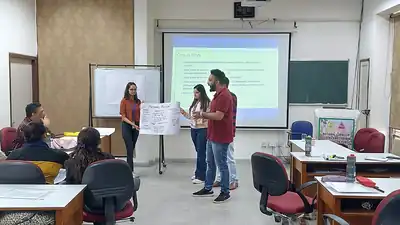 Group work presentation on flip chart at nutrition workshop