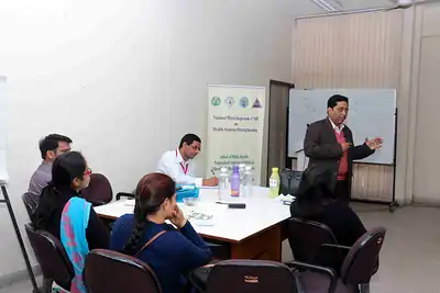 Faculty presenting to participants at group tables at 2nd NWHSS 2016, PGIMER Chandigarh