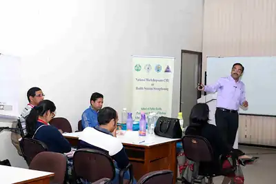 Faculty presenting to participants at tables at 2nd NWHSS 2016, PGIMER Chandigarh