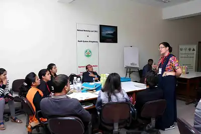 Woman faculty addressing seated participants in training room at 2nd NWHSS 2016, PGIMER Chandigarh