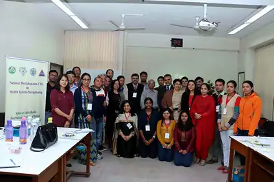 Group photo of workshop participants and faculty indoors in front of banner at 2nd NWHSS 2016, PGIMER Chandigarh