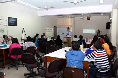 Training room view with participants at tables and presenter at 2nd NWHSS 2016, PGIMER Chandigarh
