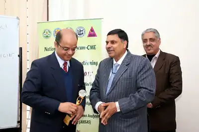 Presentation of a certificate or memento to a participant or speaker at NWHSS 2017, PGIMER Chandigarh