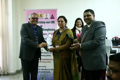 Memento presentation to a woman guest, 4th NWHSS, PGIMER Dec 2018