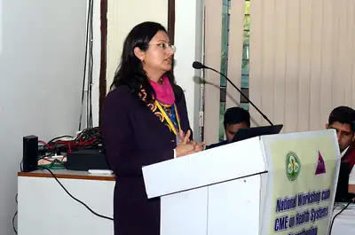 Woman speaker at the podium, 4th NWHSS, PGIMER Dec 2018