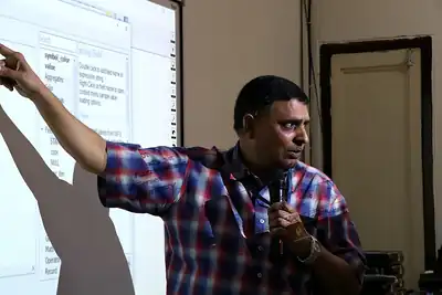 Trainer explaining GIS software to participants, 5th NWHSS GIS for public health, PGIMER 2019