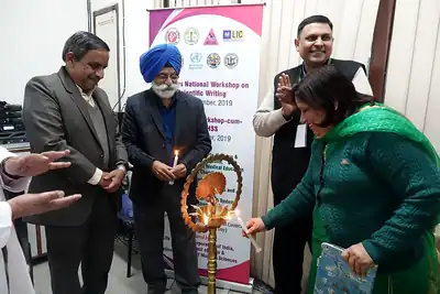 Guests lighting the ceremonial lamp, 6th NWHSS with Scientific Writing workshop, PGIMER Dec 2019