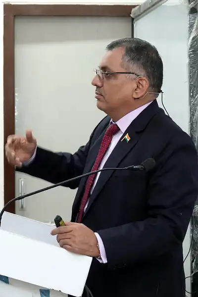 Speaker presenting with a microphone, 6th NWHSS with Scientific Writing workshop, PGIMER Dec 2019