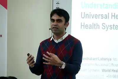 Speaker presenting a talk on universal health coverage, 6th NWHSS with Scientific Writing workshop, PGIMER Dec 2019
