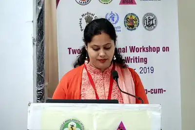 Woman speaker at the podium, 6th NWHSS with Scientific Writing workshop, PGIMER Dec 2019