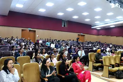 Packed auditorium of student delegates at PHASECON 2023