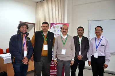 Five faculty and participants posing together at scientific writing workshop